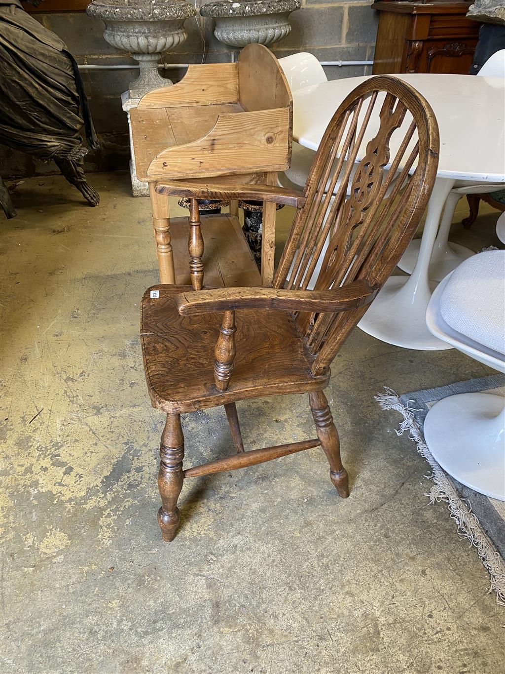 A Victorian pine two tier washstand and an elm and ash Windsor elbow chair